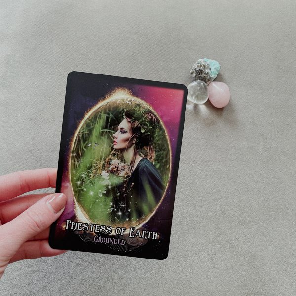 Priestess of Earth Priestess Codes Card by The Goddess Rooms with small crystals in the background